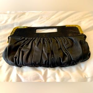 BCBG Max Azaria leather clutch handbag